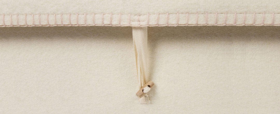 Close up image of Fleece Woolen Casket Toggle Closure