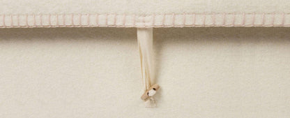 Close up image of Fleece Woolen Casket Toggle Closure